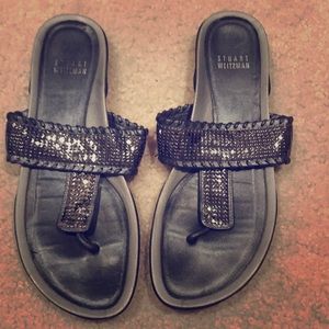 Stuart Weitzman silver sandals.